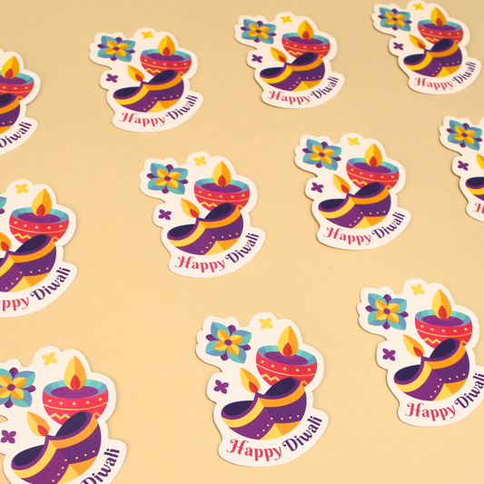 Sticker pattern with colorful Diwali designs on a beige background