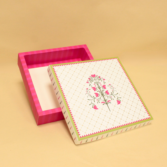 Decorative box with floral design on a beige background