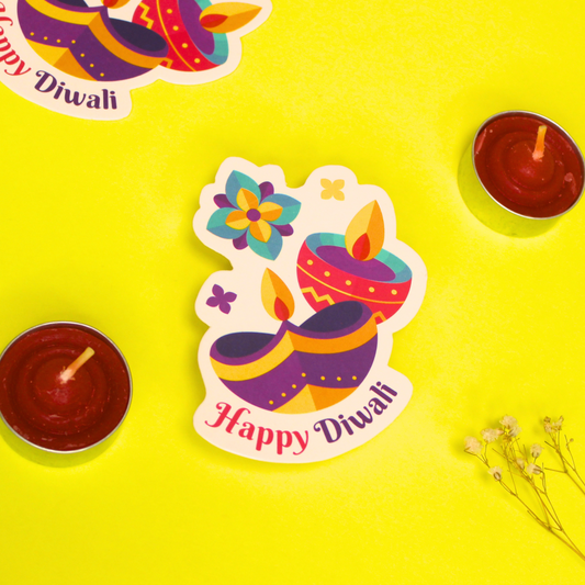 Colorful 'Happy Diwali' sticker with candles on a yellow background